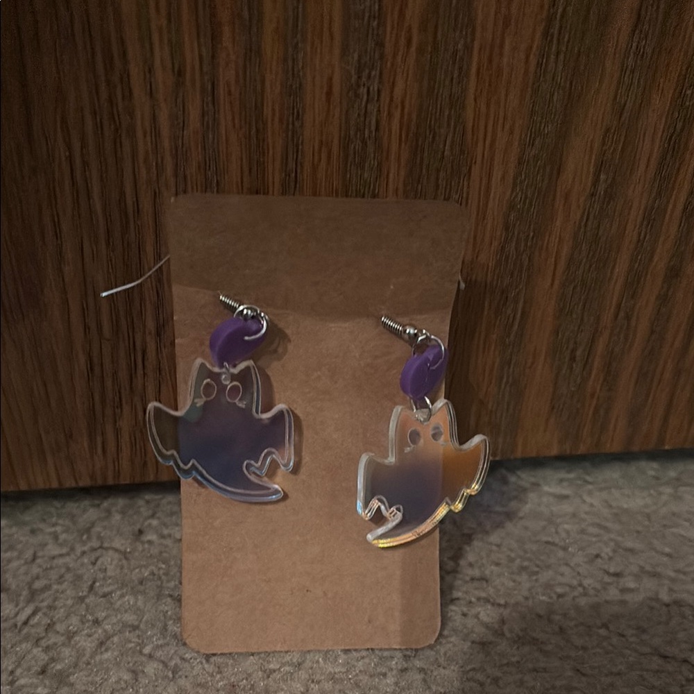 NWOT Purple and Clear Ghost Earrings